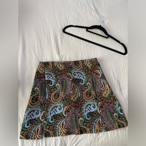 Buy it and never used , too small for me, floral mini skirt